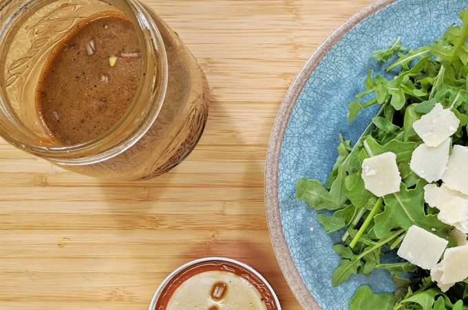 Salad on a Plate with Salad Dressing in a Jar