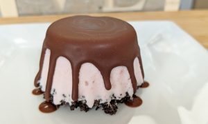 Chocolate Covered Ice Cream with Oreo Crust on White Plate