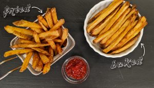 Baked French Fries on a white plate and Fried french fries in a fry basket with ketchup on a black background