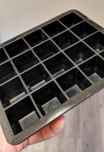 Black Silicone Ice Cube Tray in Hand