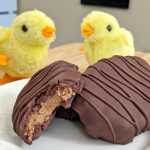 Keto Reese's Peanut Butter Cups on a white plate in egg shape with chicks